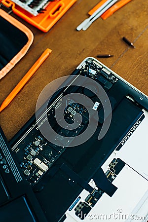 Dismantle laptop with tools and battery, display, hard disk and other components Stock Photo