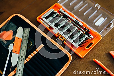 Dismantle laptop with tools and battery, display, hard disk and other components Stock Photo