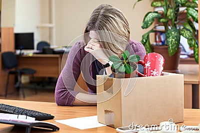 Dismissal at work, weeping employee Stock Photo