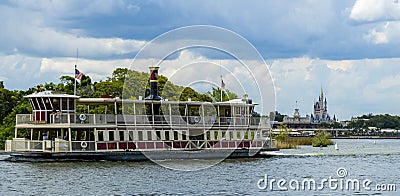 Disney World Orlando Florida Magic Kingdom Mississippi paddle steamer and cinderella princess castle Editorial Stock Photo