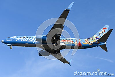 Disneyland Resort - Pixar Pier paint scheme on Alaska Airlines 737 Editorial Stock Photo