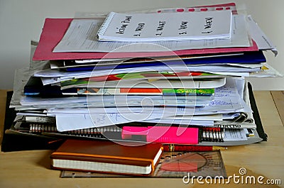 Disordered papers, clutter on a desk Stock Photo