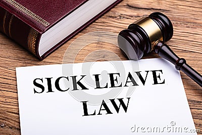 Sick Leave Law Documents With Book And Gavel Stock Photo