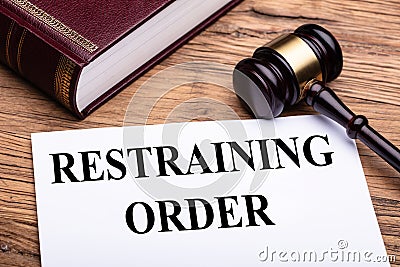 Restraining Order Documents Near Gavel And Law Book Stock Photo