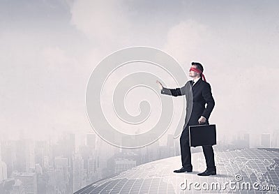 Disoriented blindfolded businessman concept Stock Photo