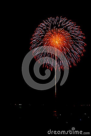 Disperse fireworks in dark night. Stock Photo