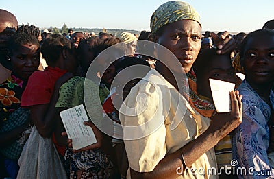 Displaced people receiving aid in a camp in Angola Editorial Stock Photo