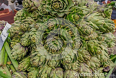 Display of artichokes on sale at a market stall Stock Photo