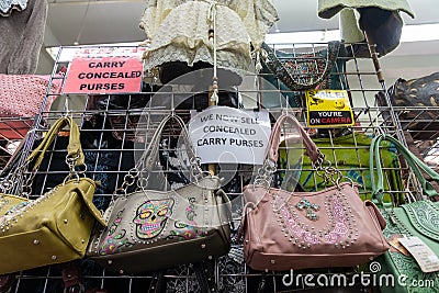 Display of concrealed carry gun purses for woman at the Minnesota State Fair Editorial Stock Photo