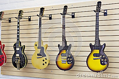 Display of guitars in a guitar store Stock Photo