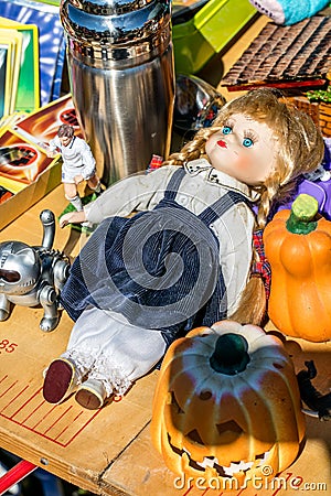 Display of second-hand doll, toys, decoration and football collectors Stock Photo