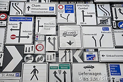 Display of the traffic signs at the exterior wall of the Swiss Museum of Transport in Lucerne, Switzerland. Editorial Stock Photo