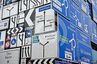 Display of the traffic signs at the exterior wall of the Swiss Museum of Transport in Lucerne, Switzerland. Editorial Stock Photo