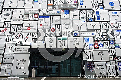 Display of the traffic signs at the exterior wall of the Swiss Museum of Transport in Lucerne, Switzerland. Editorial Stock Photo