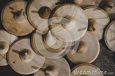 Displayed in the window toy wooden whirligig. Stock Photo
