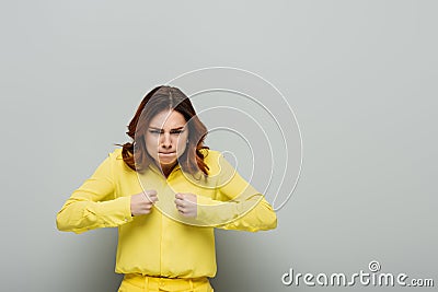 displeased woman with angry grimace and Stock Photo