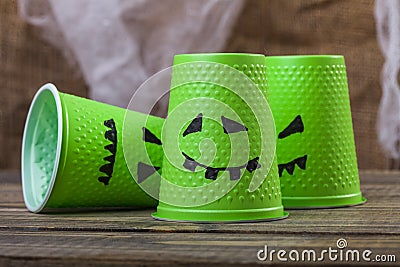 Disposable cups with ghost smiles Stock Photo