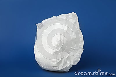 Disposable diaper on background. Child`s underwear Stock Photo