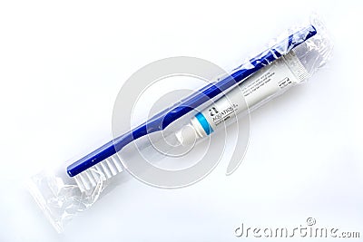 disposable oral hygiene kit for travel isolated. Promo set in hotel, train Editorial Stock Photo