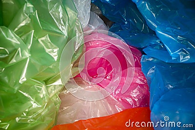 Disposable plastic bags background. Lightweight transparent, reusable plastic waste. Rubbish bags, plastic recycling Stock Photo