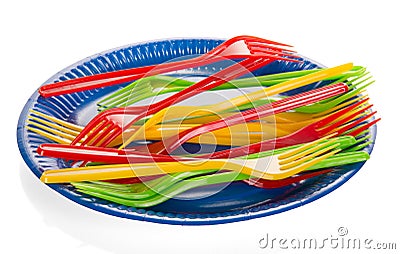 Disposable plastic plate and multicolored plugs on white. Stock Photo