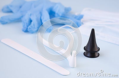 Disposable set of otolaryngologist`s tools: medical instruments and Instrumental equipment in the ENT doctor`s office. Stock Photo