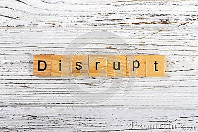 DISRUPT word made with wooden blocks concept Stock Photo