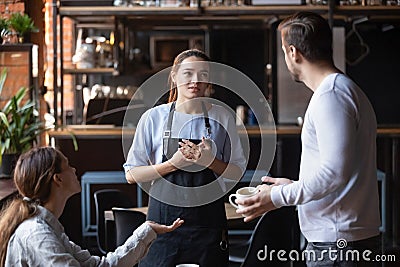 Dissatisfied restaurant clients complaining about bad service Stock Photo