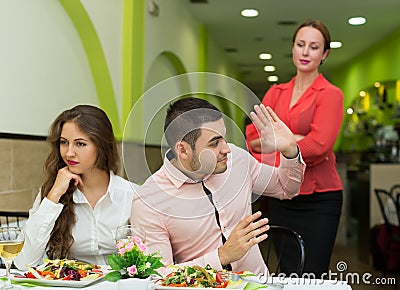 Dissatisfied visitors in restaurant Stock Photo