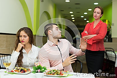 Dissatisfied visitors in restaurant Stock Photo