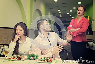 Dissatisfied visitors in restaurant Stock Photo