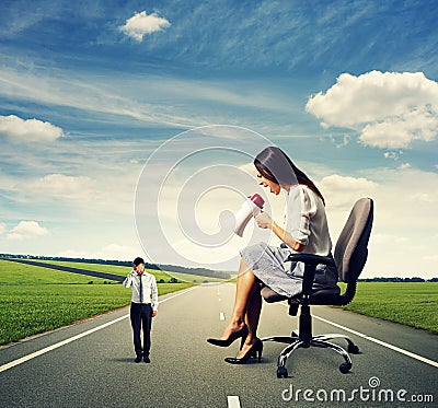Dissatisfied young woman and sad man Stock Photo