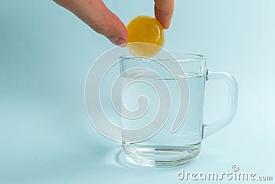 Dissolvable drinks dissolving cubes to add superfoods. On a blue background Stock Photo