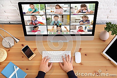 Distance education during quarantine and lockdown due to Covid-19 pandemic. Teacher giving online school lesson Stock Photo