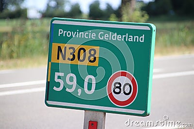 Distance sign along regional road N308 in the Netherlands Editorial Stock Photo
