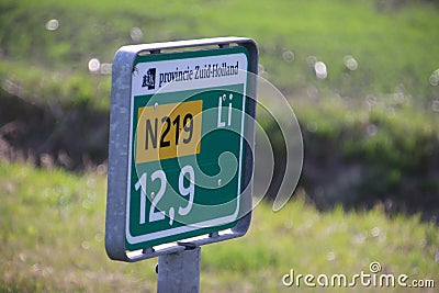 Distance sign along regional road N219 in the Netherlands Editorial Stock Photo