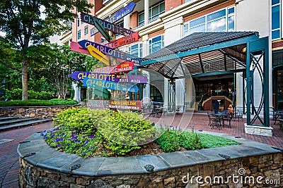 Distance signs at The Green, in Uptown Charlotte, North Carolina Editorial Stock Photo