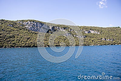 distant coastline of the Limski Kanal, Rovinj, Croatia Stock Photo