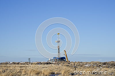 Distant drill rig Stock Photo