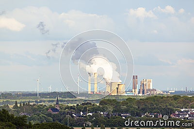Distant Power Station in Rural Landscape Stock Photo