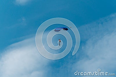 Distant shot of a skydiving male Editorial Stock Photo