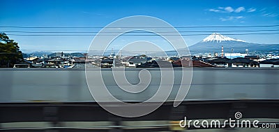 Distant View of Mount Fuji from bullet train Stock Photo