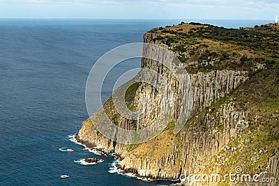 Tourist boats viewing Tasman Island, Tasmania, Australia Editorial Stock Photo