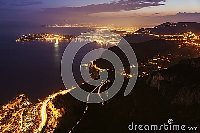 Distant view of Saint Jean Cap Ferrat and Nice at sunset Stock Photo