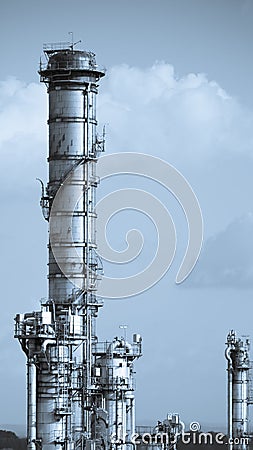 Distillation columns as part of the process equipment in a chemical plant monochromatic Stock Photo