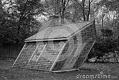 The distorted wood sculpture Huff and Puff strains reality for the visitor 2 Editorial Stock Photo