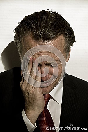 Distraught businessman Stock Photo
