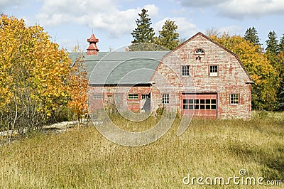 Distressed red barn in autumn, Acadia National Park, Maine Stock Photo