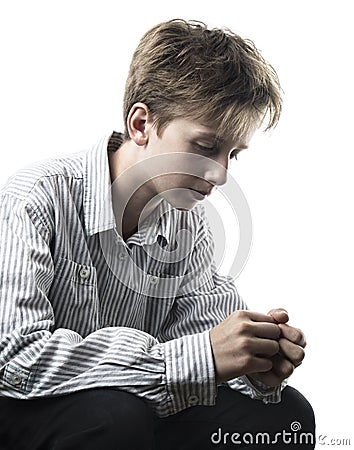 Distressed teenager isolated on white Stock Photo