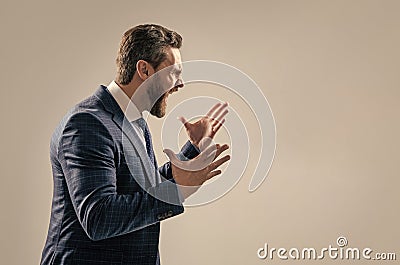 Distressful experience. Angry boss scream making wide gesture. Professional man scream in anger Stock Photo